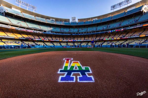 The Dodgers wet rainbow on their logo behind the pitcher’s mound on Queer "pride night"