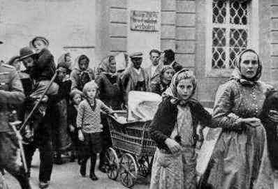 Terrified and homeless Germans flee their Allied executioners.