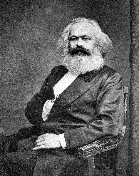 Karl Marx, descendant of a family of rabbis. Notice where his hand is a freemasonic sign.