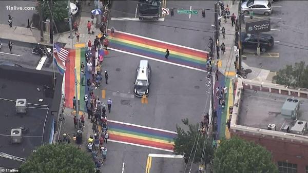 John Lewis’ hearse stopped in the middle of the Rainbow Crosswalks in Atlanta, Georgia one last time on his major funerals journey. John Lewis was an early forerunner of the LGBTQ+ rights movement. 