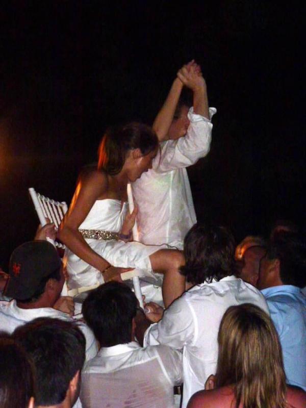 Meghan participating at the “chair dance” at her first marriage.
