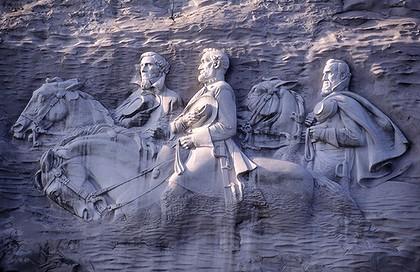 Three Confederate heros carved into the side of Stone Mountain, Georgia: President Jefferson Davis, General Robert E. Lee and General Stonewall Jackson.