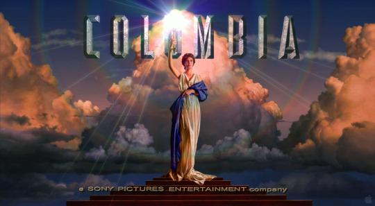 Columbia holding a torch as the symbol of Columbia Pictures.