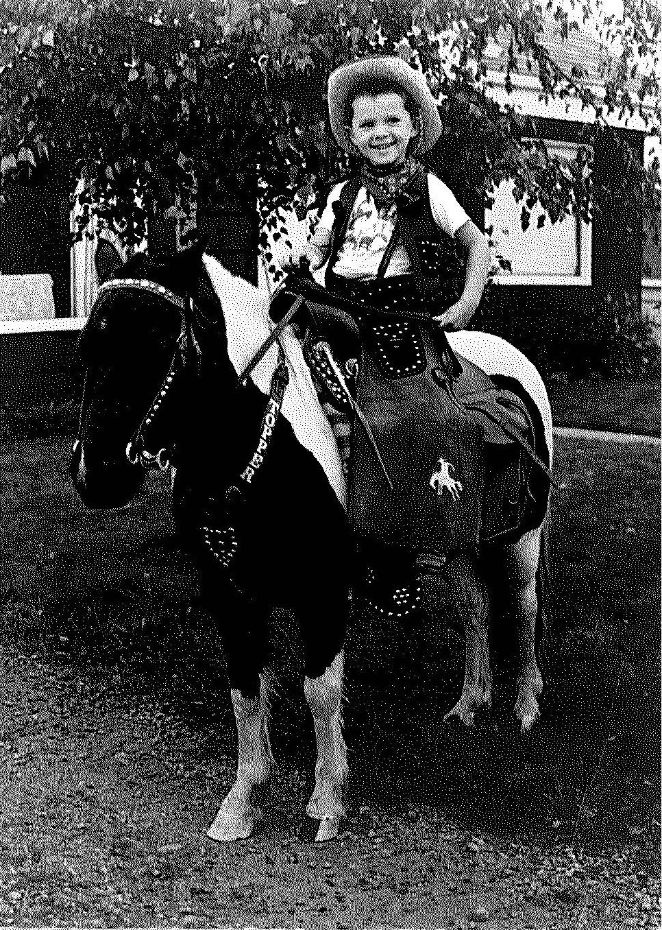 Me, playing a cowboy at the age of 5