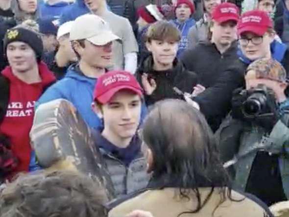 The high school students were rushed by a band of Indians, led by an old Indian, Mr. Phillips, with a drum.  When asked why he felt compelled to speak up to the teens, Mr. Phillips said, “For me just to walk by and have a blind eye to it, something just didn’t allow me to do it.” 