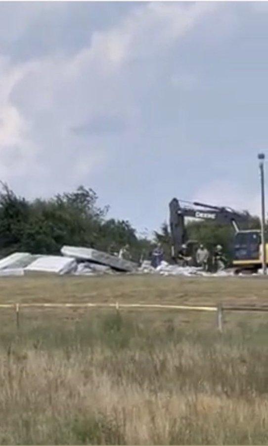 A local TV station reported the remaining Guidestones being leveled by an excavator later in the morning.